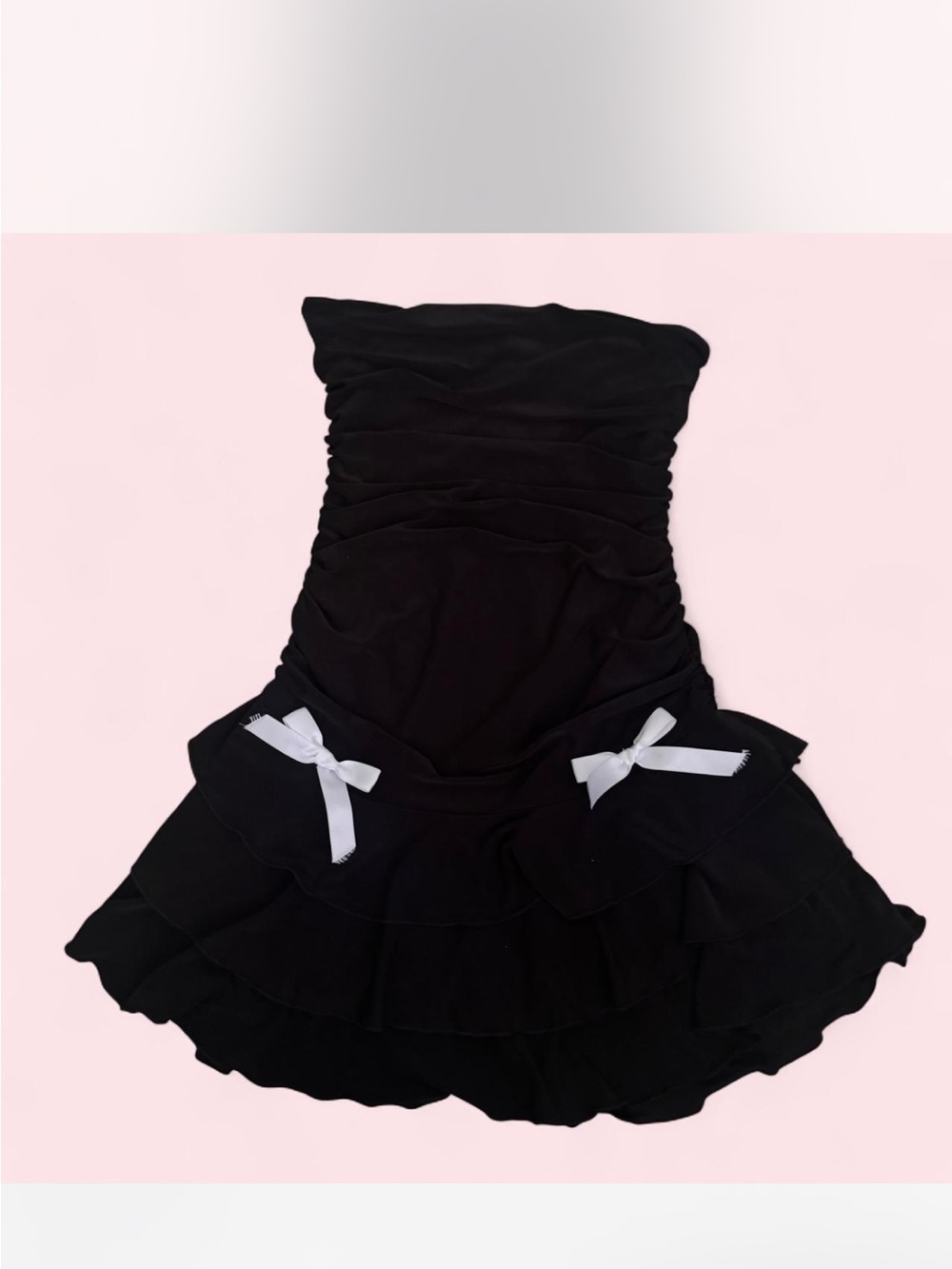 Black Strapless Ruffled Mini Dress with White Bow Accents